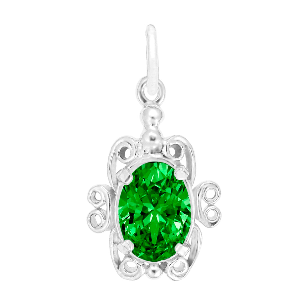 Silver pendant with a green gemstone on a white background