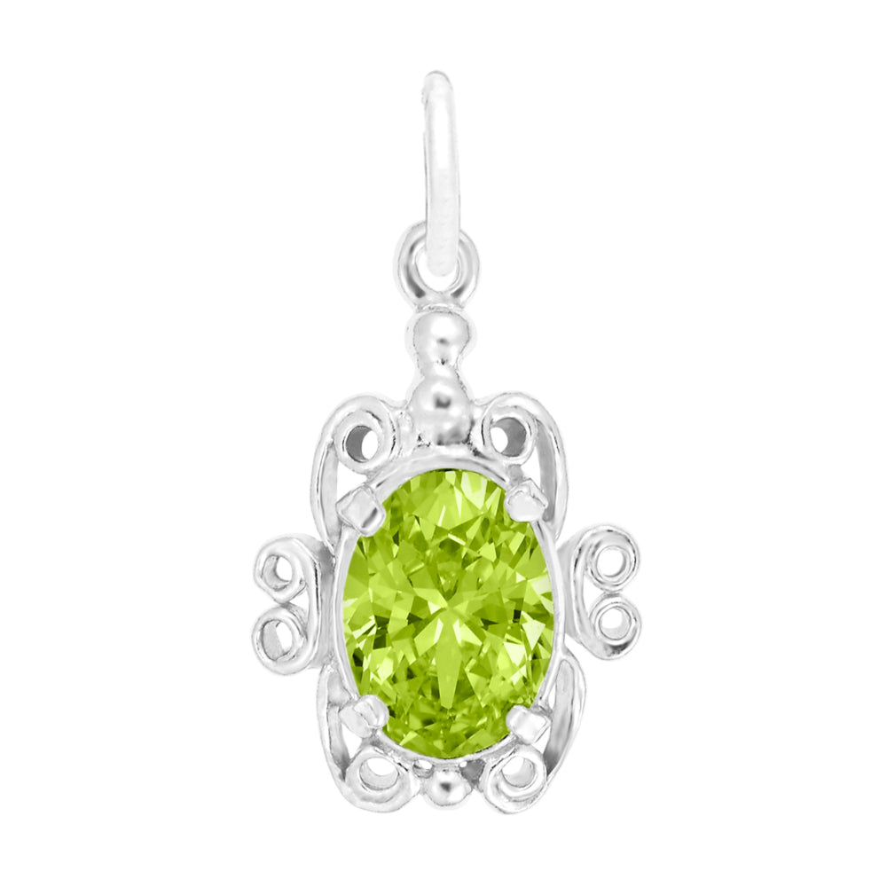 Silver pendant with a green gemstone on a white background