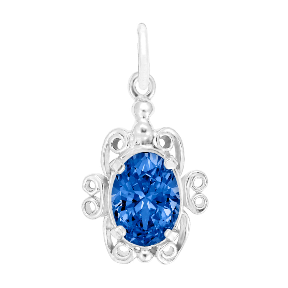 Silver pendant with a blue gemstone on a white background