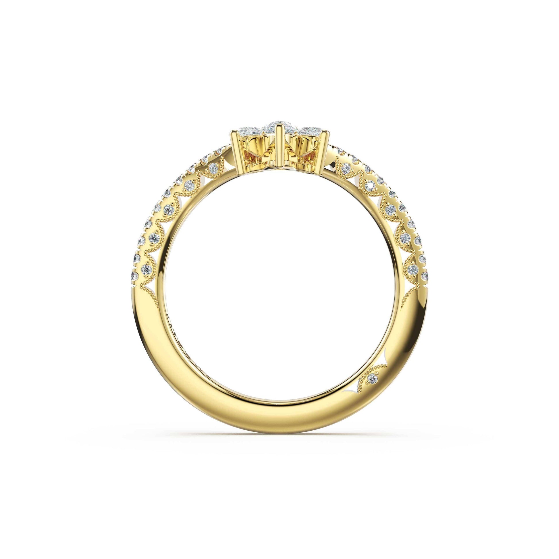 Gold ring with diamond accents on a white background