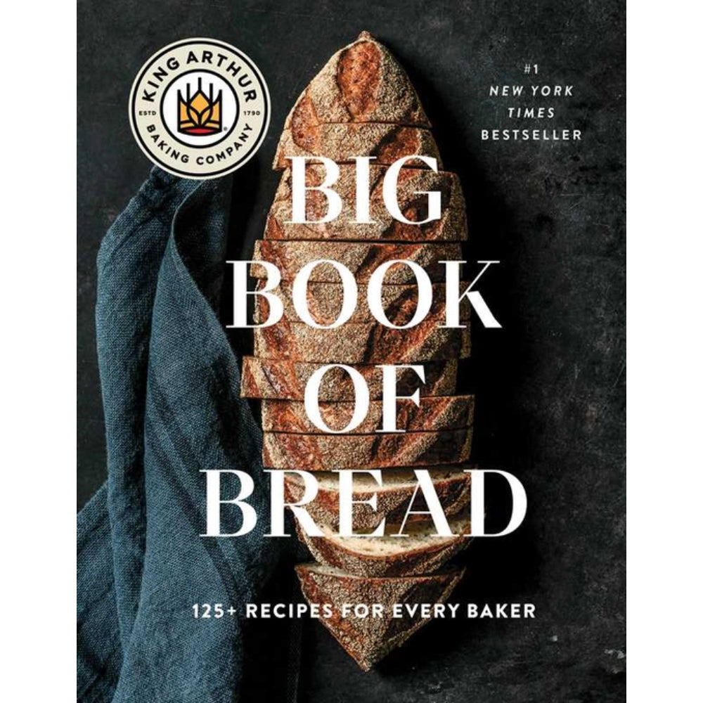 Book cover of 'Big Book of Bread' by King Arthur Baking Company with sliced bread and a blue towel.