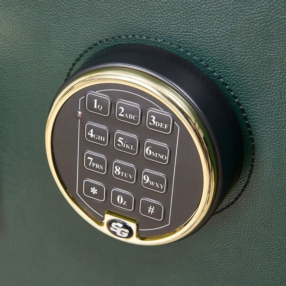Digital keypad on a green safe door