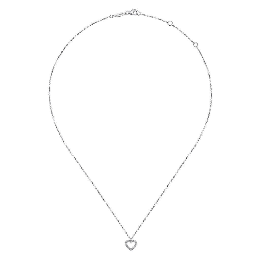Silver necklace with a heart pendant on a white background