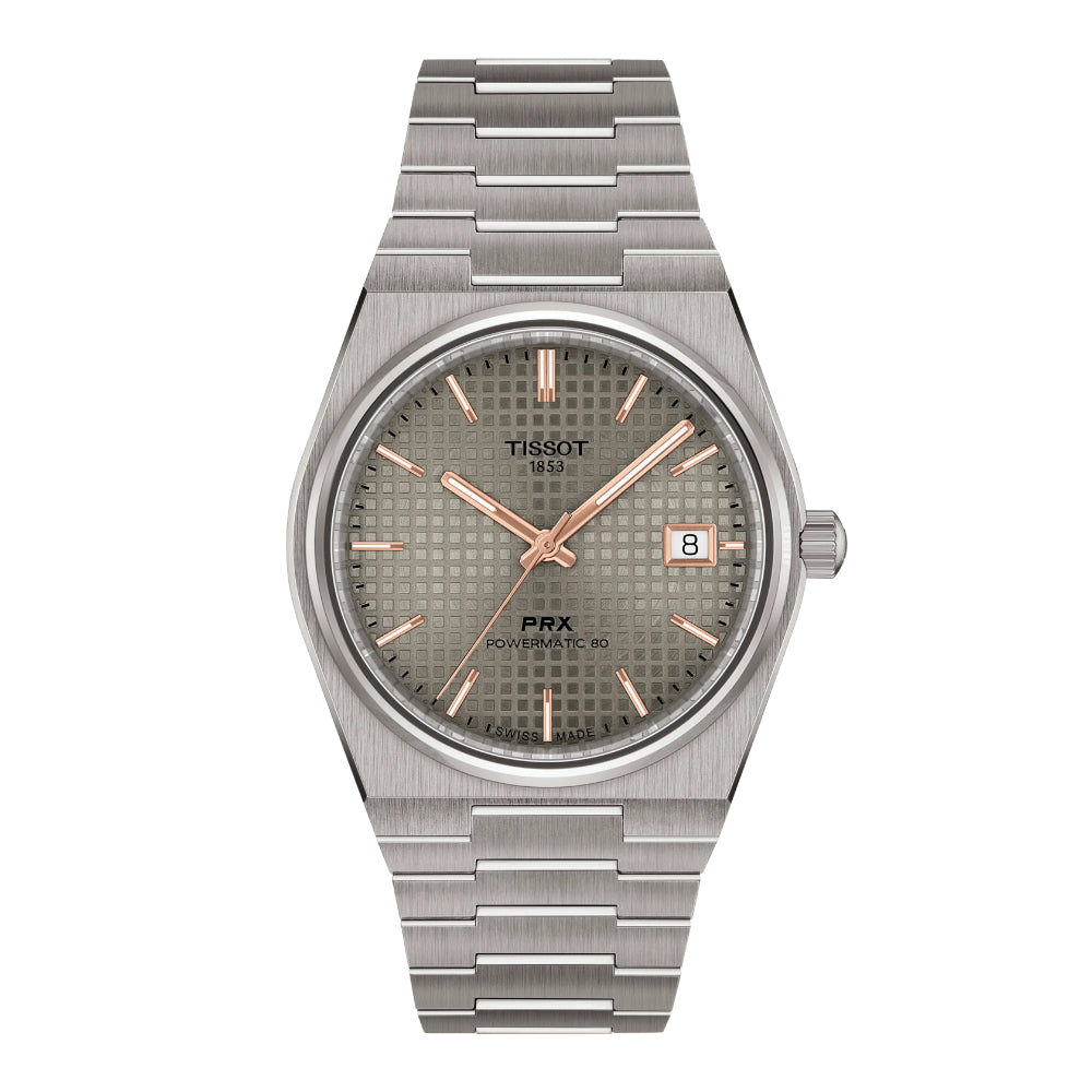Silver Tissot watch with a detailed face on a white background