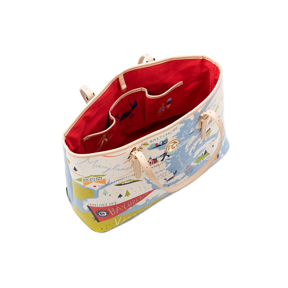 A photo  showing the red inside of a large tote bag with a colorful map design of the Chesapeake Bay on a white background.