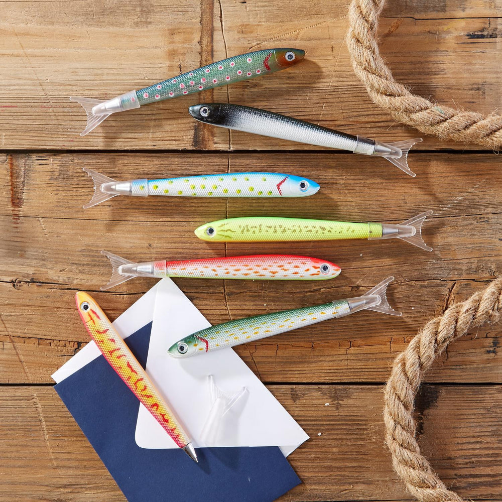 Colorful fishing lures on a wooden surface with ropes.