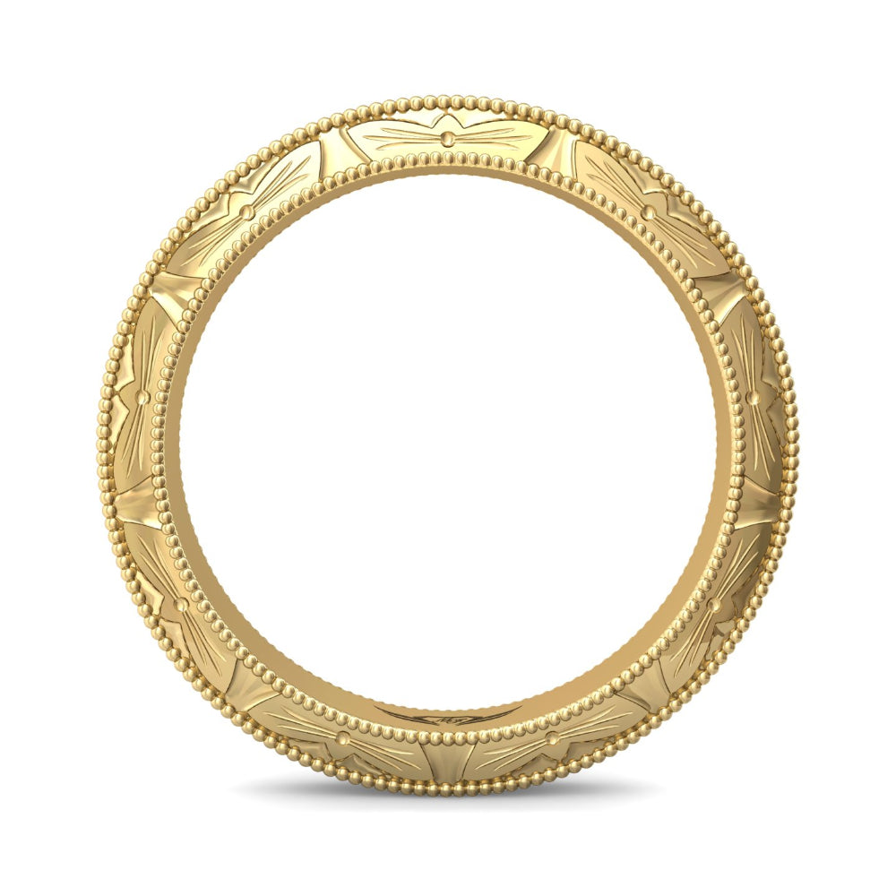 A gold ring with an intricate Art Deco style pattern and beaded outer edge, shown on a clean white background.