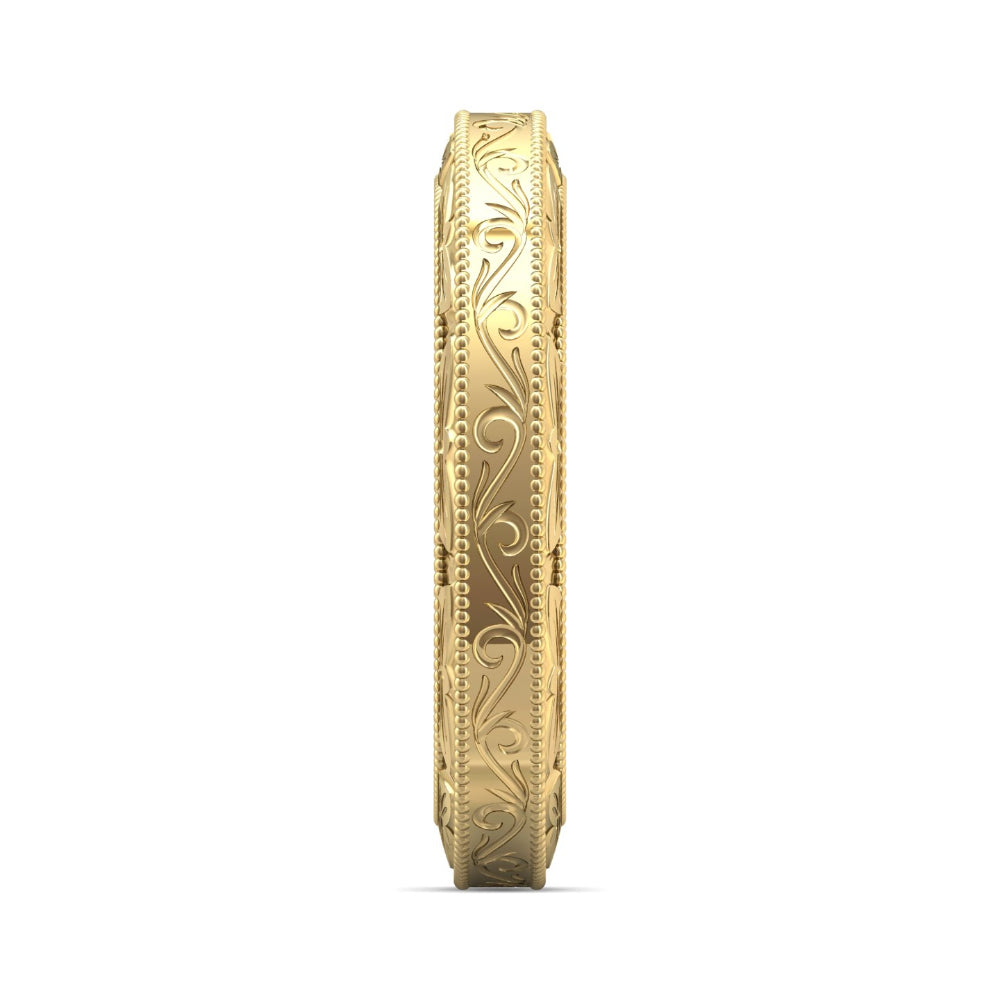A gold bangle bracelet with intricate floral engraving, shown in a side profile view against a plain white background.