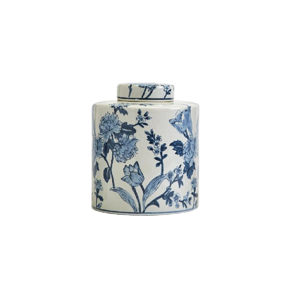 A medium cylindrical ceramic jar with a matching lid, decorated with a classic blue and white floral toile pattern, set against a plain white background.