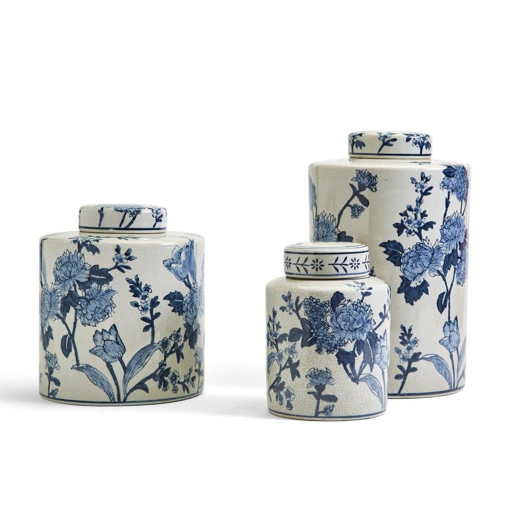 Three Ceramic jars with blue floral patterns in sizes: Large, Medium & Small on a white background.