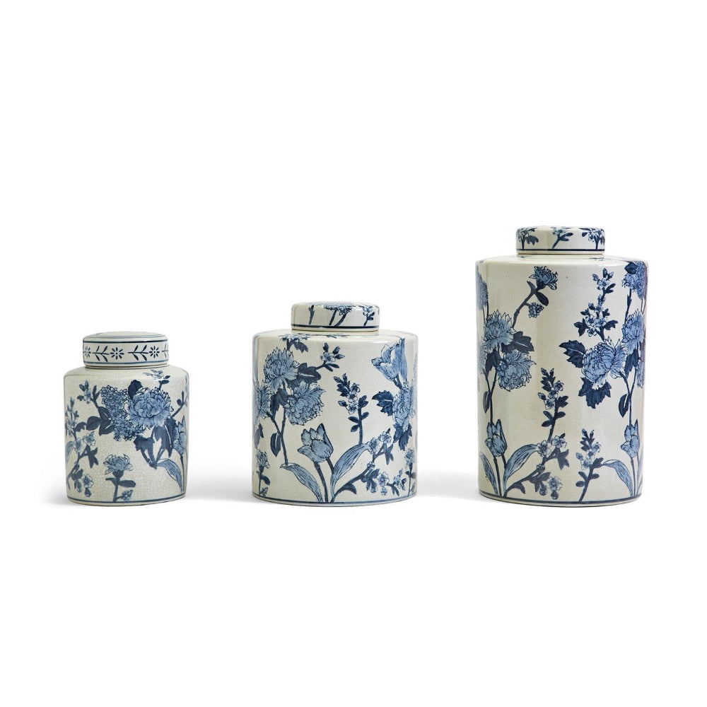 Three Ceramic jars with blue floral patterns in a line in sizes: Large, Medium & Small on a white background.