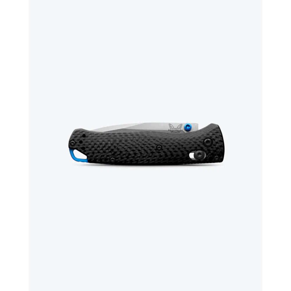 Black textured object with blue accents on a white background