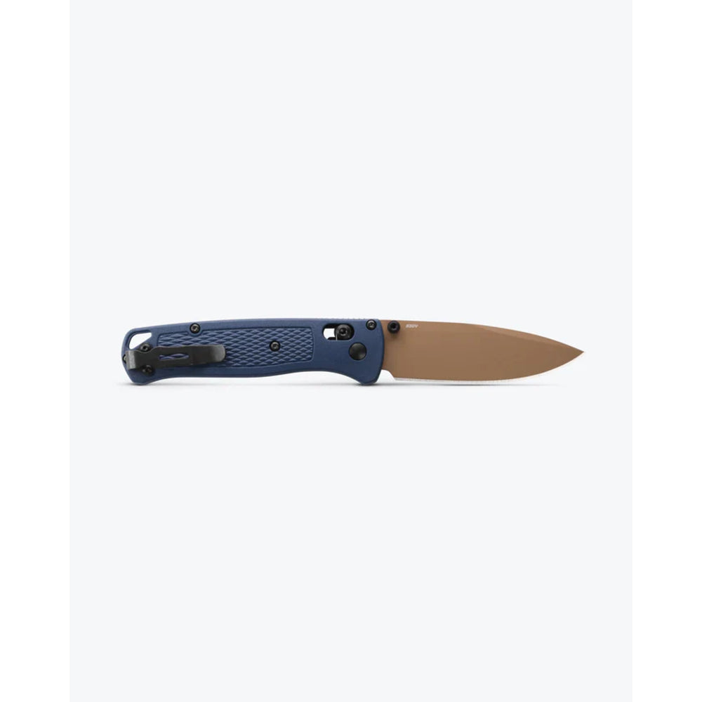 A folding pocket knife with a textured dark blue handle and a tan blade, shown horizontally against a plain white background.