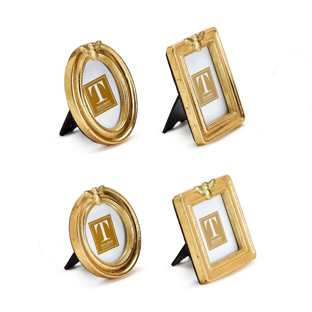 A side angled photo of four gold leaf photo frames with a bee motif in different shapes: round, oval, square, and rectangle.
