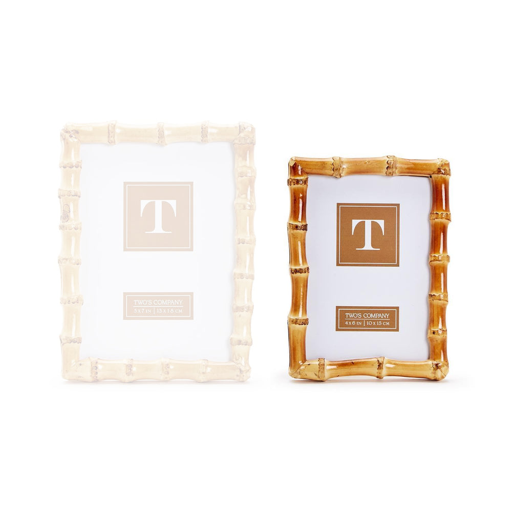 A tan 4x6 picture frame with a bamboo design on a white backround. 