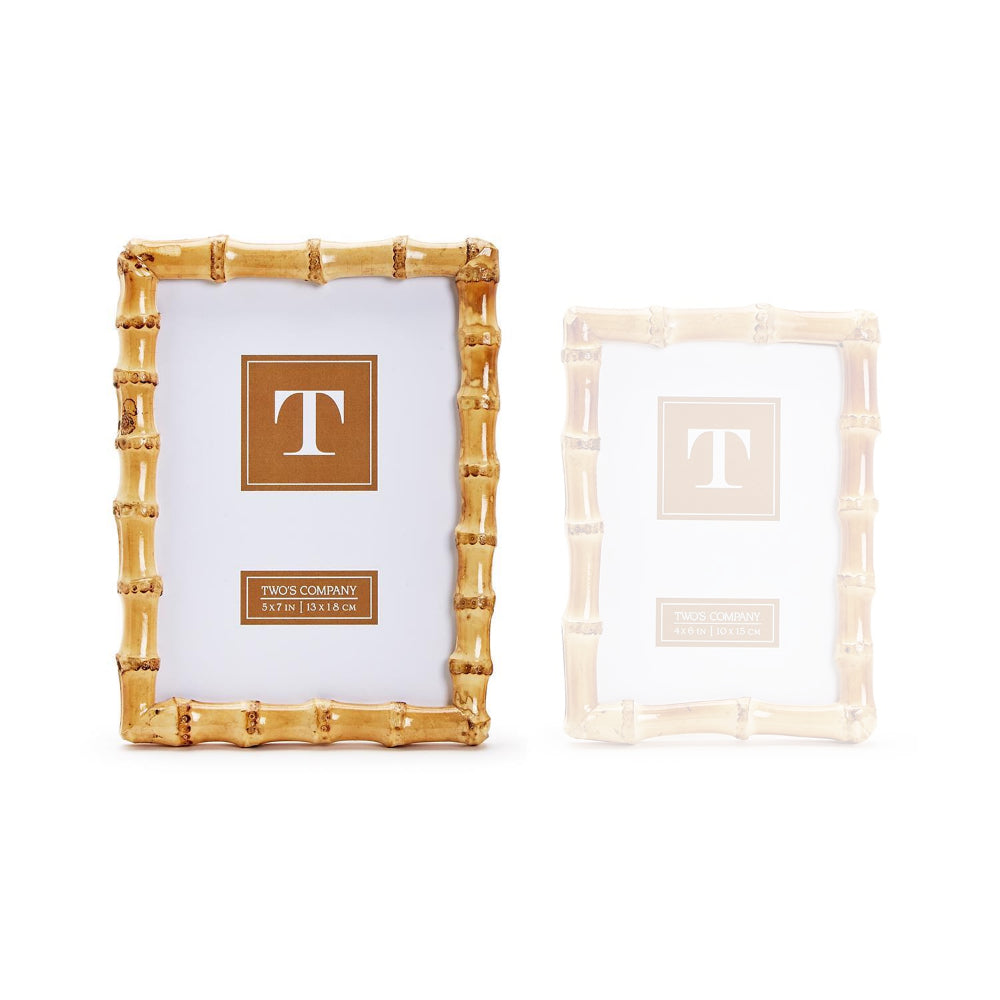 A tan 5x7 picture frame with a bamboo design on a white backround. 