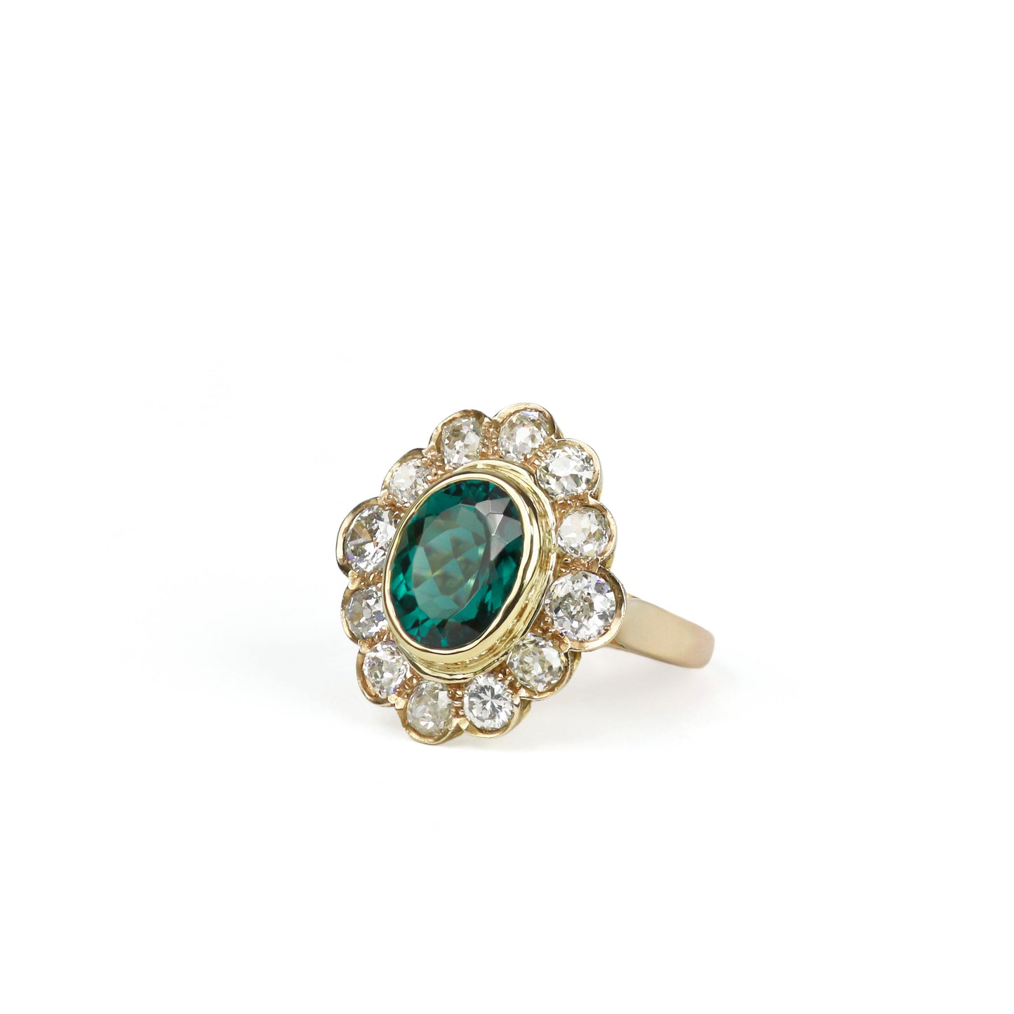 Estate 18 Karat Yellow Gold Oval Tourmaline and Diamond Halo Ring