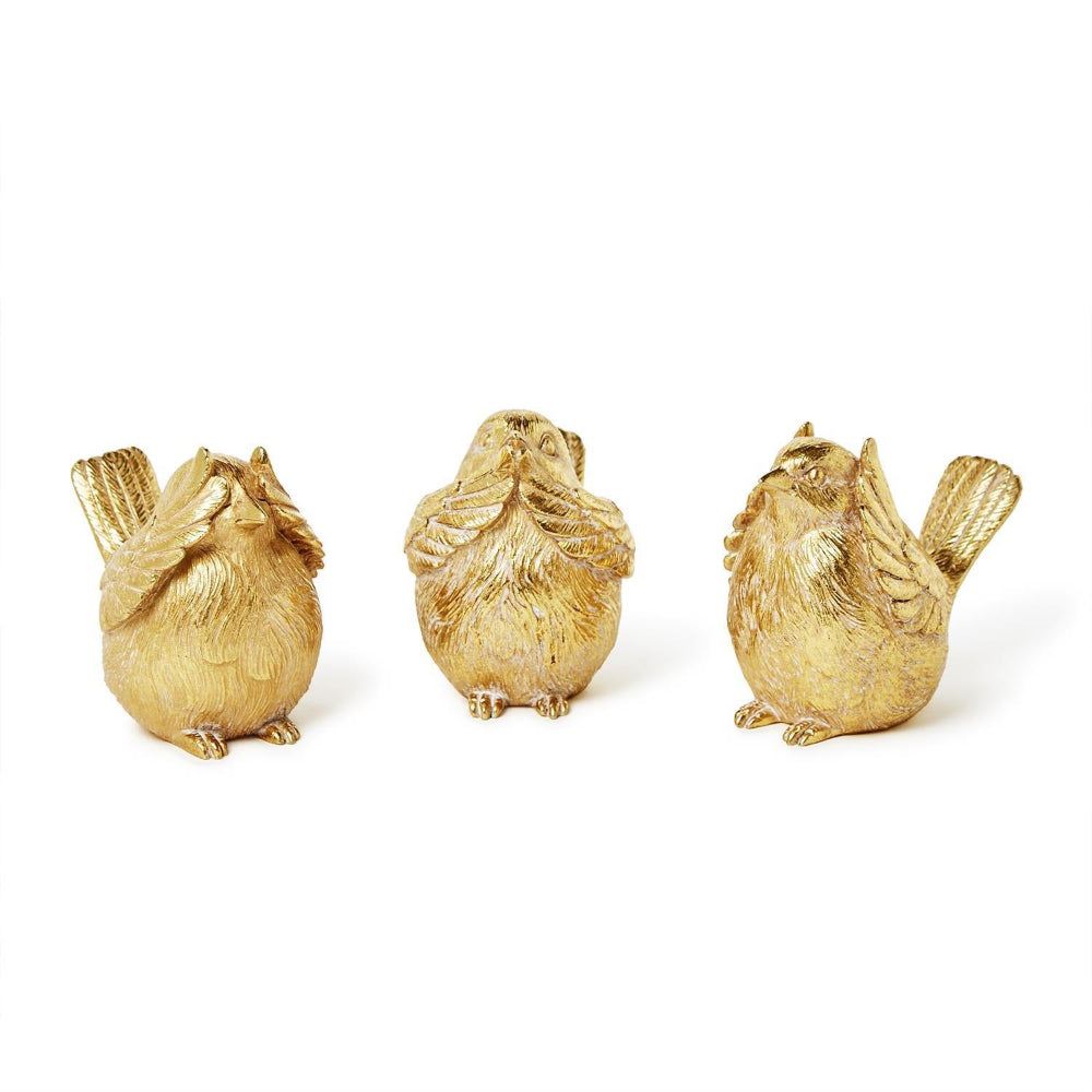 Three gold bird figurines on a white background.