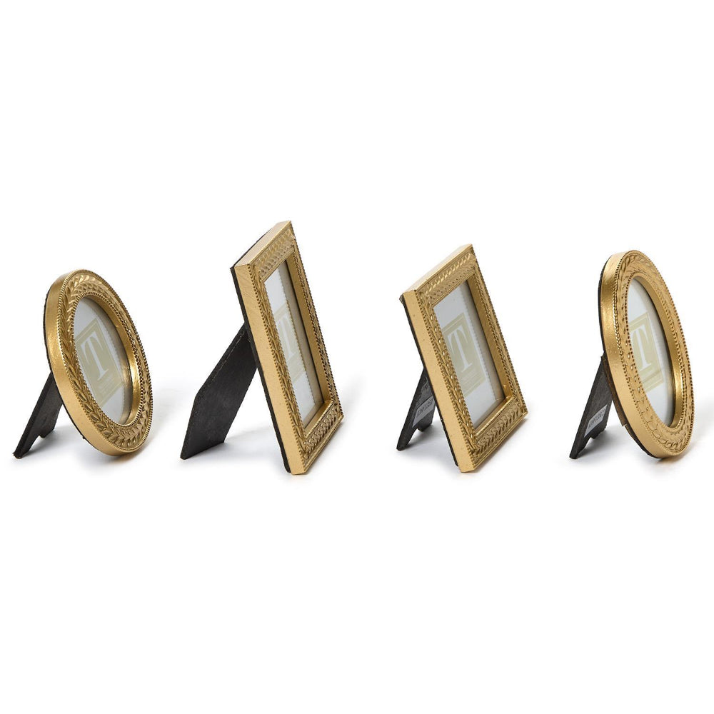 A side photo of four gold picture frames in four differant shapes: Oval, Rectangle, Round & square on a white background.
