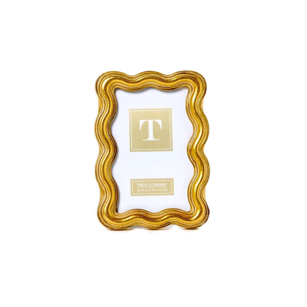 A gold 4x6 wave edged decorative frame with a white center on a white background.