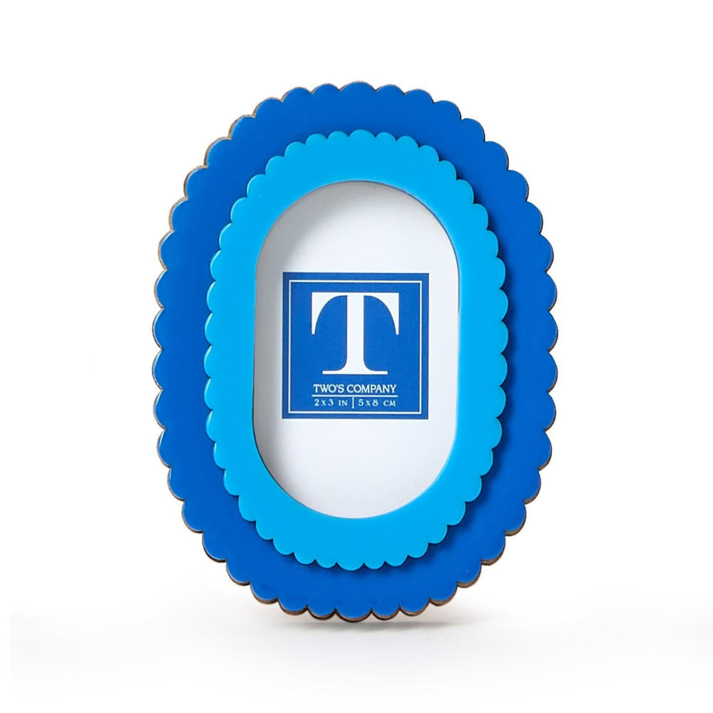 Blue scalloped picture frame with a visible brand logo on a white background.