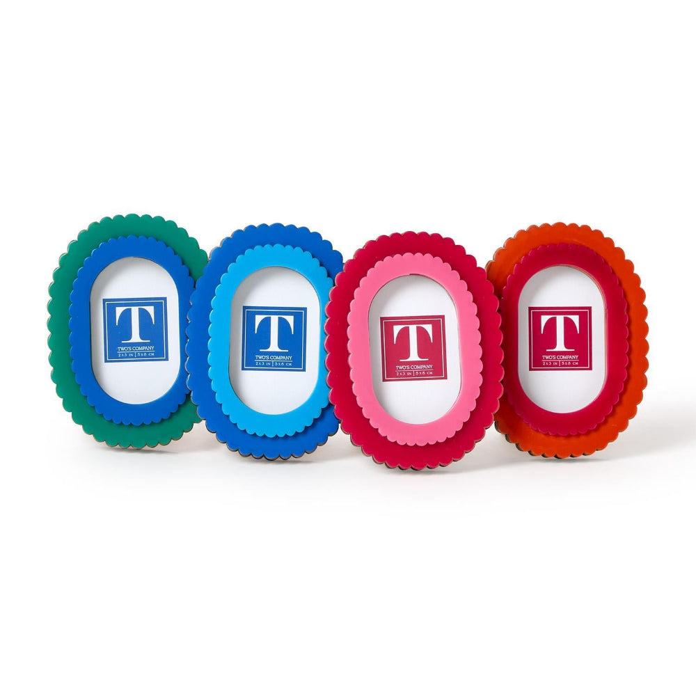 Four colorful picture frames in 2x3 on a white backround. 