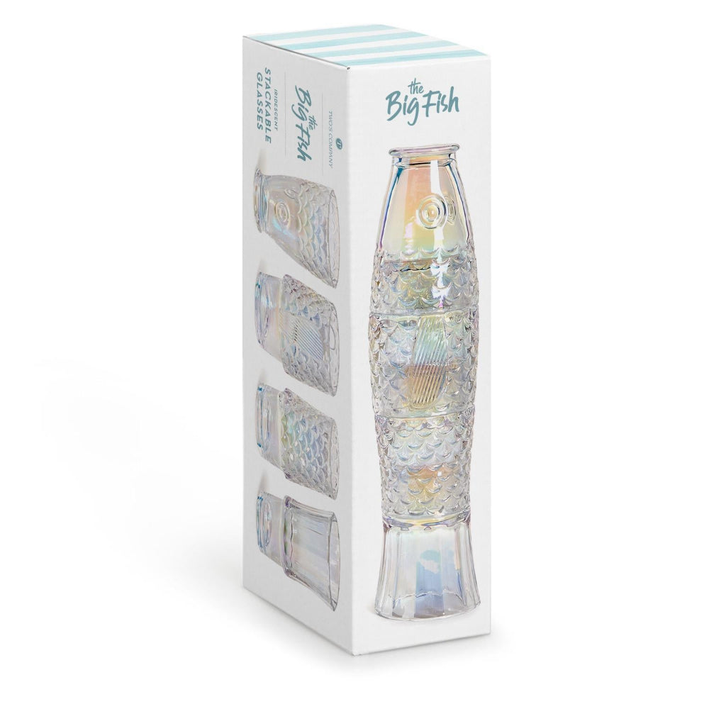 The Big Fish glass candle set in its original white packaging box, featuring an iridescent, fish-shaped glass candle with stacked tiers and four smaller matching shot glasses.