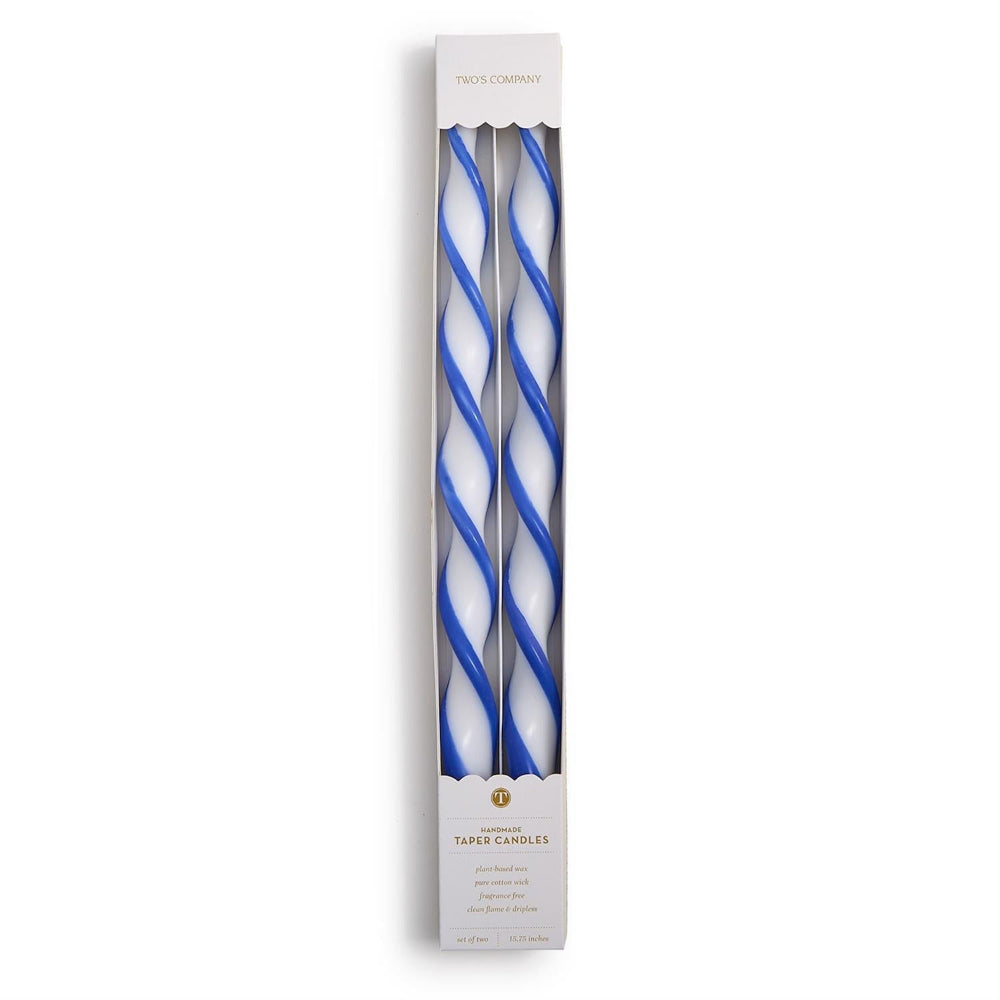 Three twisted taper candles in a white box with blue and white spiral candle design, shown on a white background.