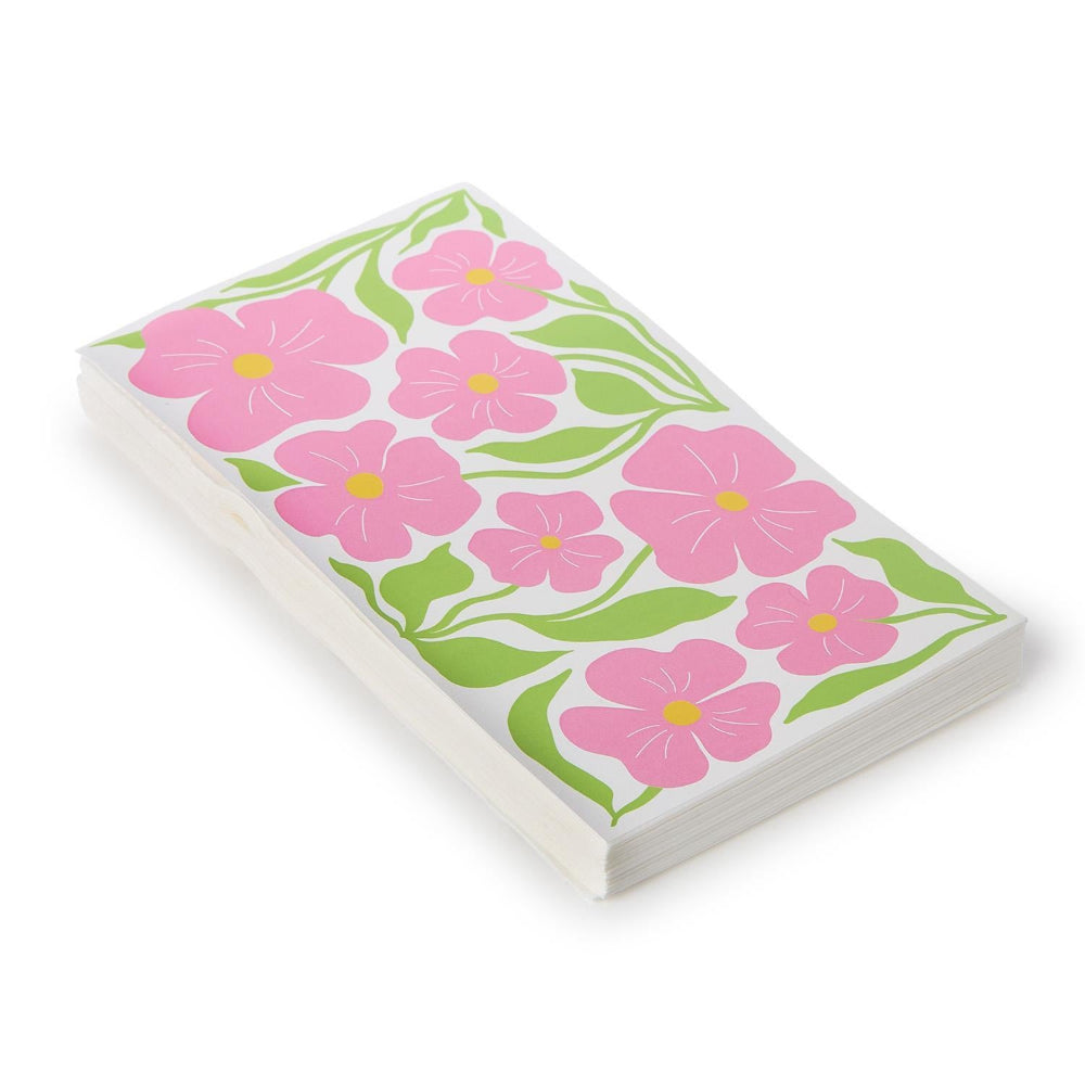 Paper cocktail napkins with a pink floral design on a white background.