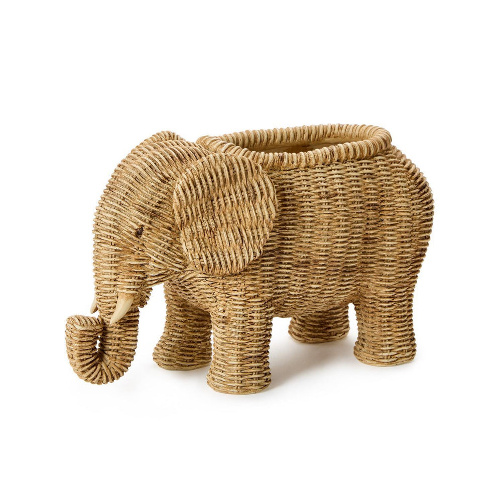 Woven tan elephant-shaped planter on a white background.