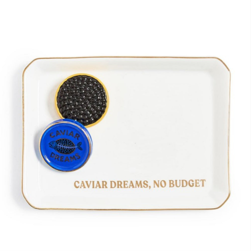 Tray with caviar and 'Caviar Dreams, No Budget' text on a white background.