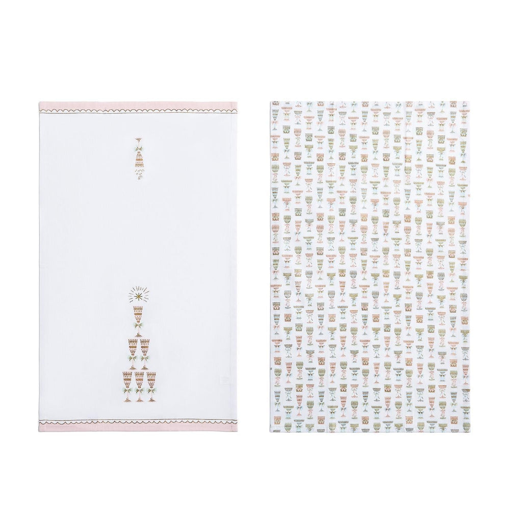 Two blue and white patterned towels on a white background.