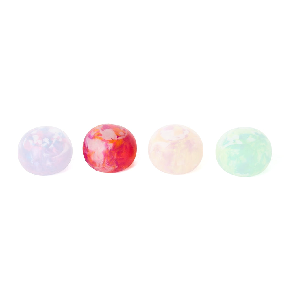 Pink  marbled stress ball on a white backound.