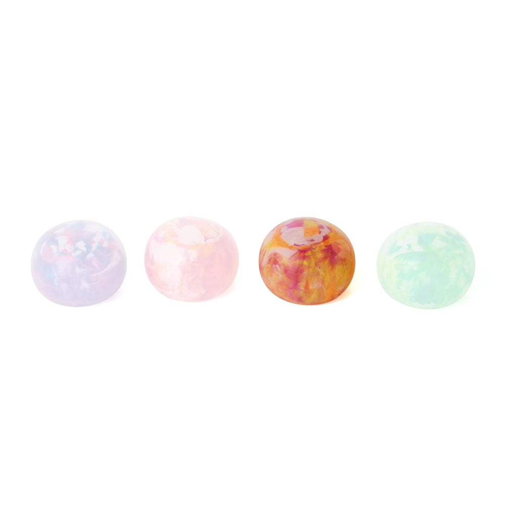 Yellow marbled stress ball on a white backound.