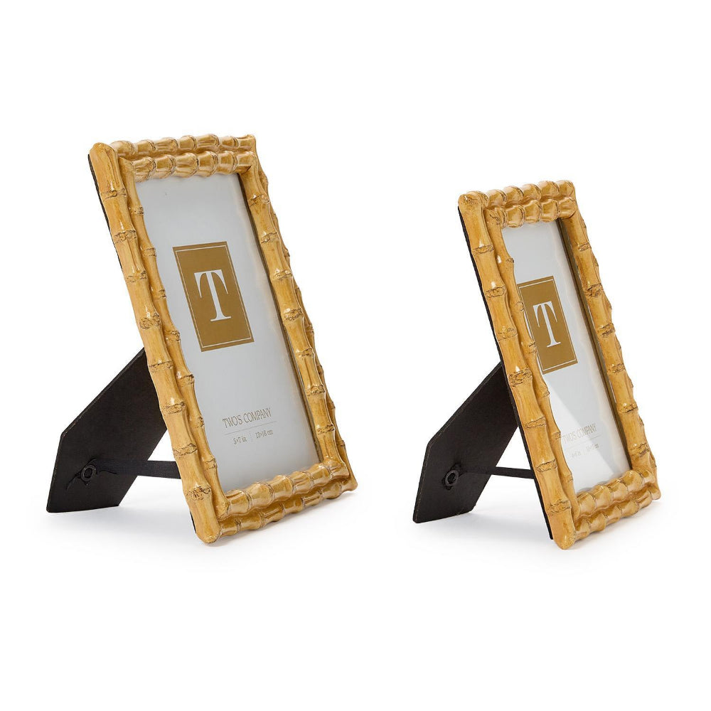 The side of two bamboo-style picture frames with black stands on a white background.