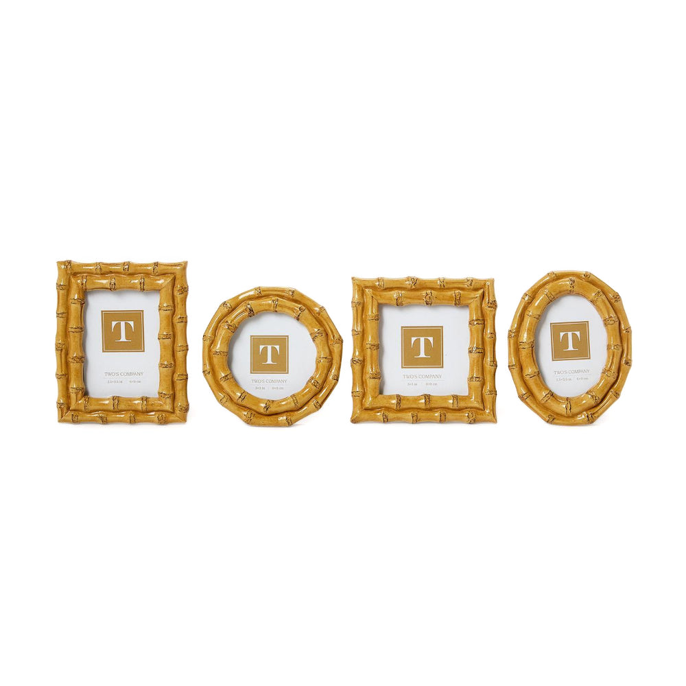 Four tan bamboo-style picture frames in sizes: round, square, rectangle & round on a white background.