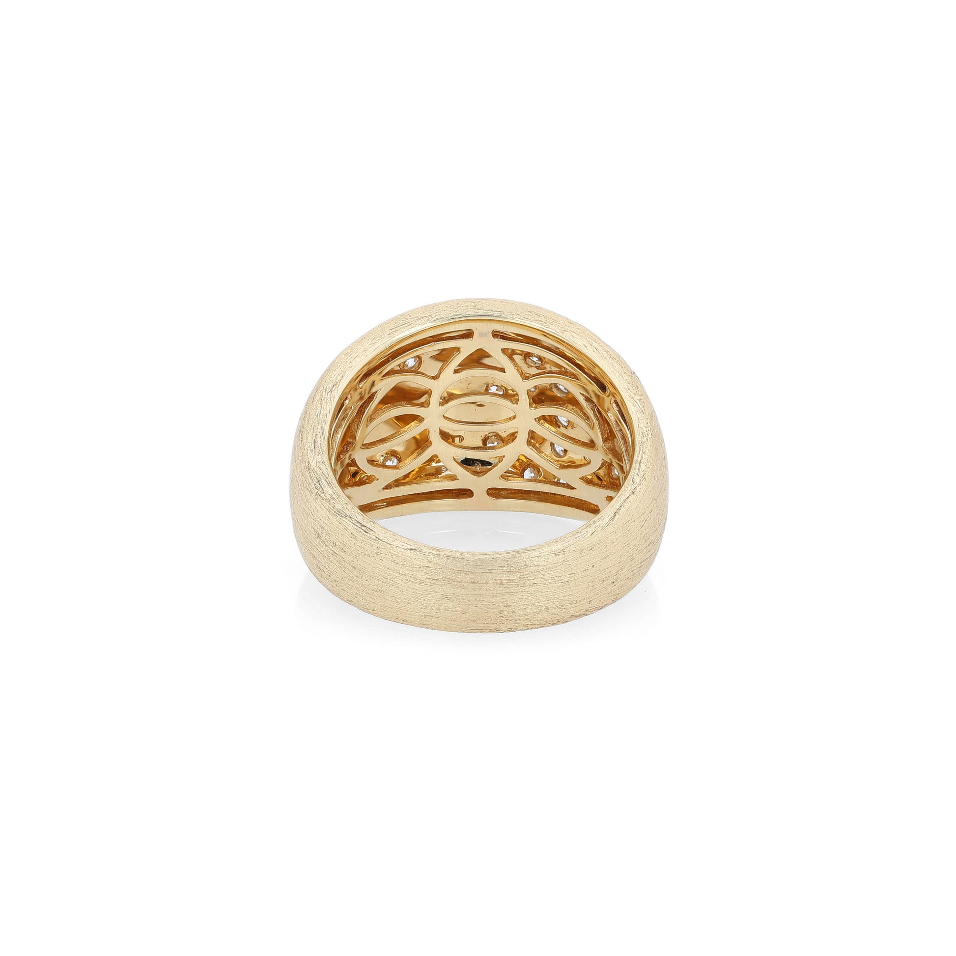 Gold ring with intricate design on a white background