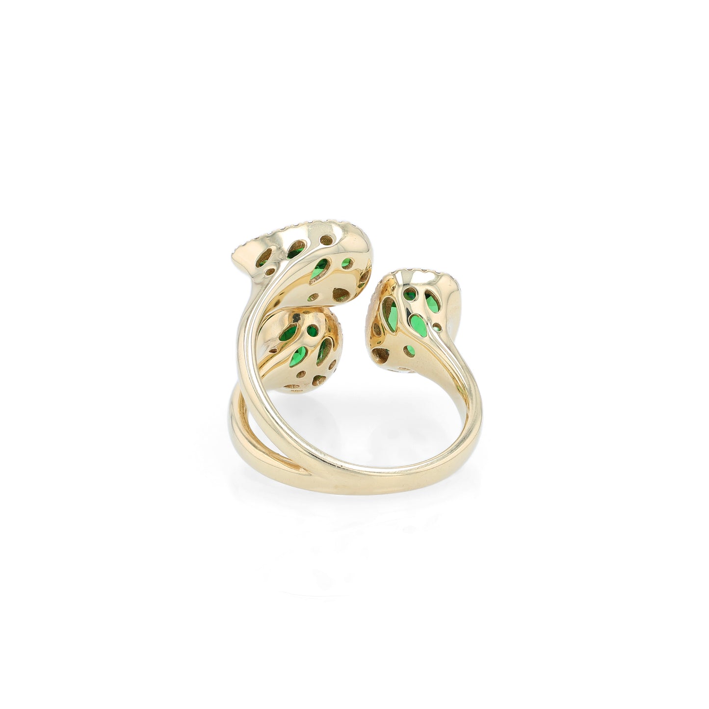Gold ring with green tsavorite garnets and diamond halos on a white background