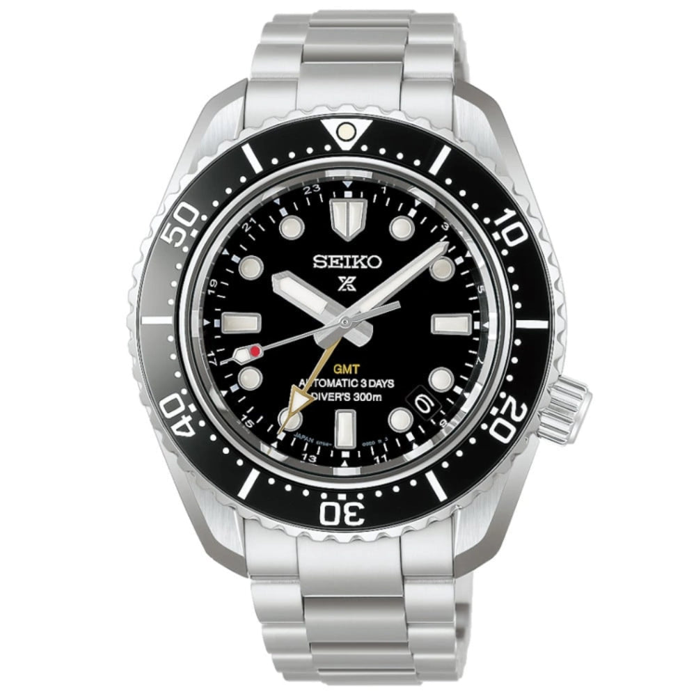 Seiko watch with black dial and silver metal strap on a white background