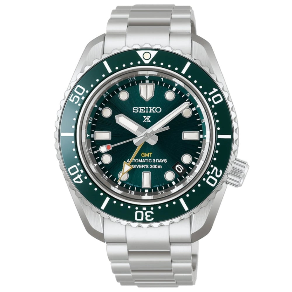 Seiko watch with green bezel and silver bracelet on a white background