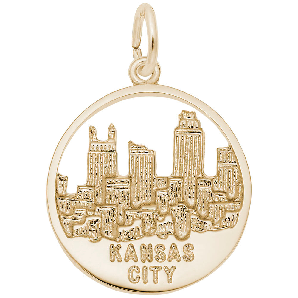 Gold charm with Kansas City skyline design on a white background