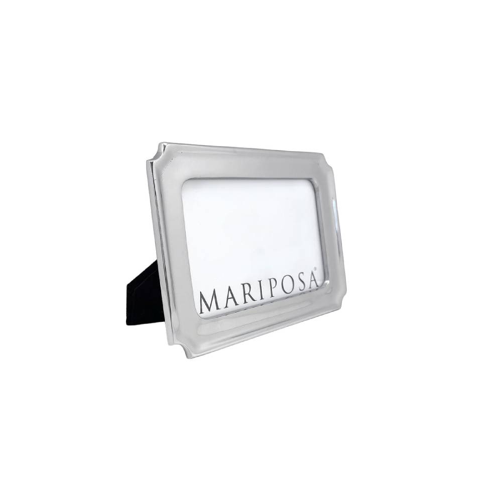 A silver metallic picture frame with a small black stand, featuring the brand name 'MARIPOSA' printed on the front, set against a plain white background.