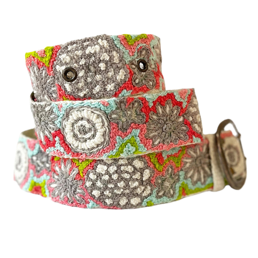 Floral patterned belt on a white background