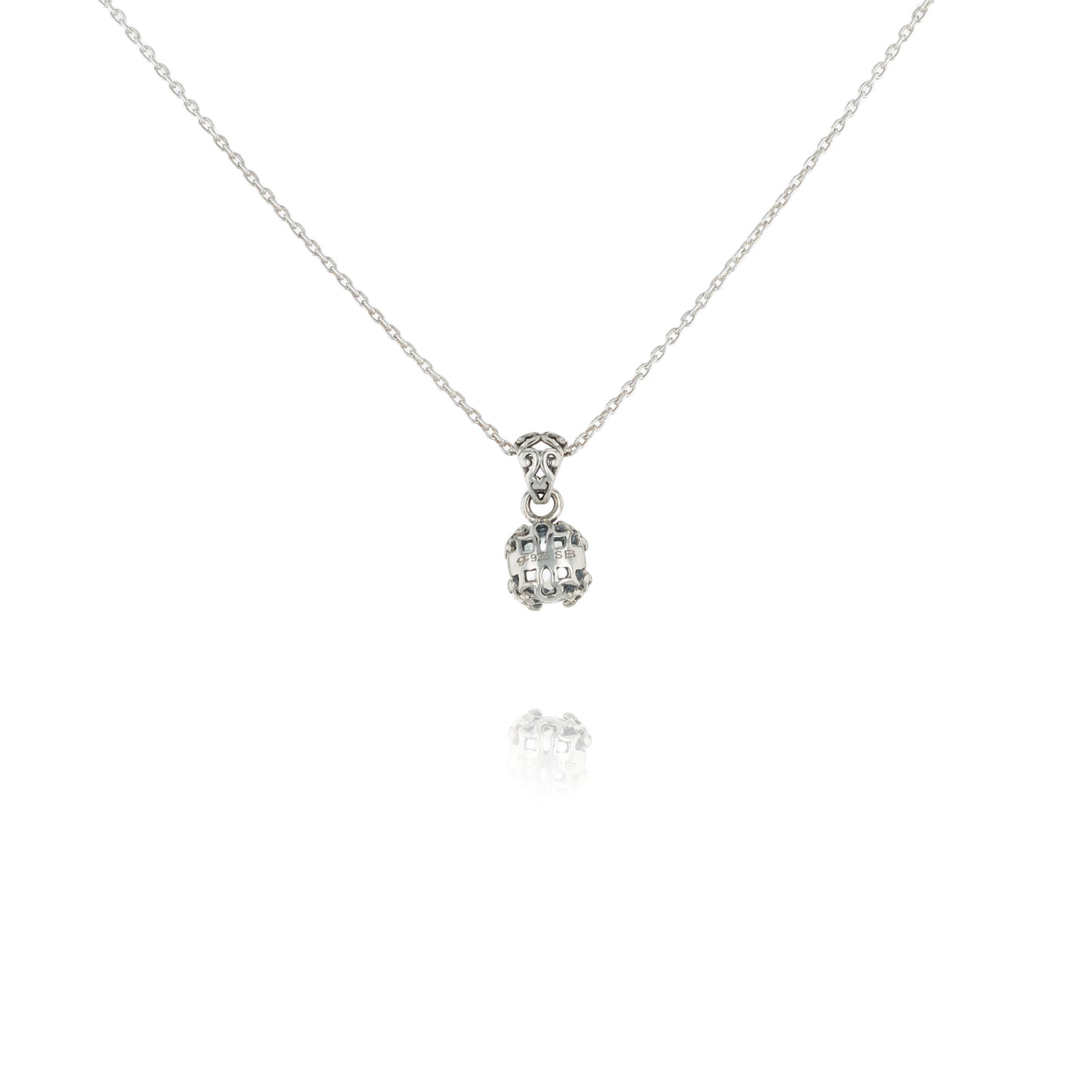 Back view of a Silver necklace with a White Topaz pendant on a white background