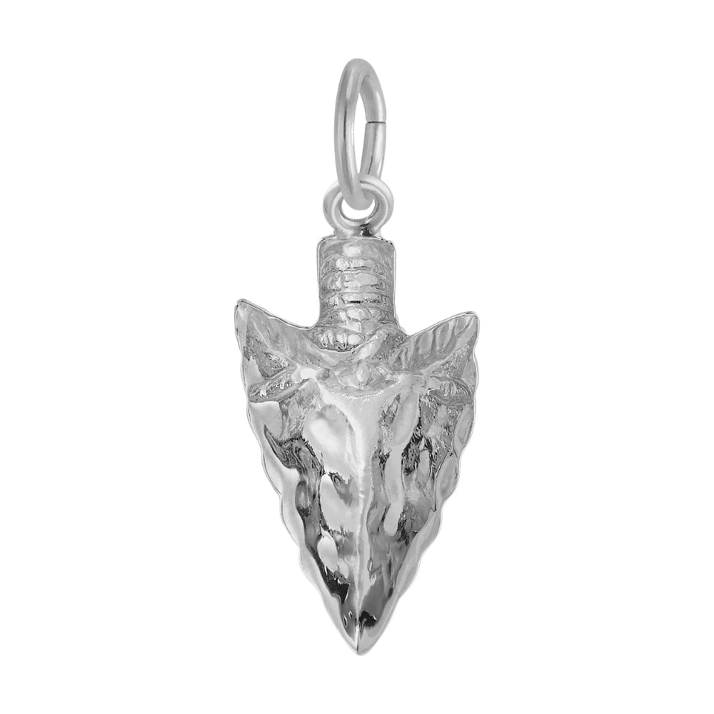 Reverse side of A silver arrowhead charm with a textured, hammered finish, shown on a plain white background.