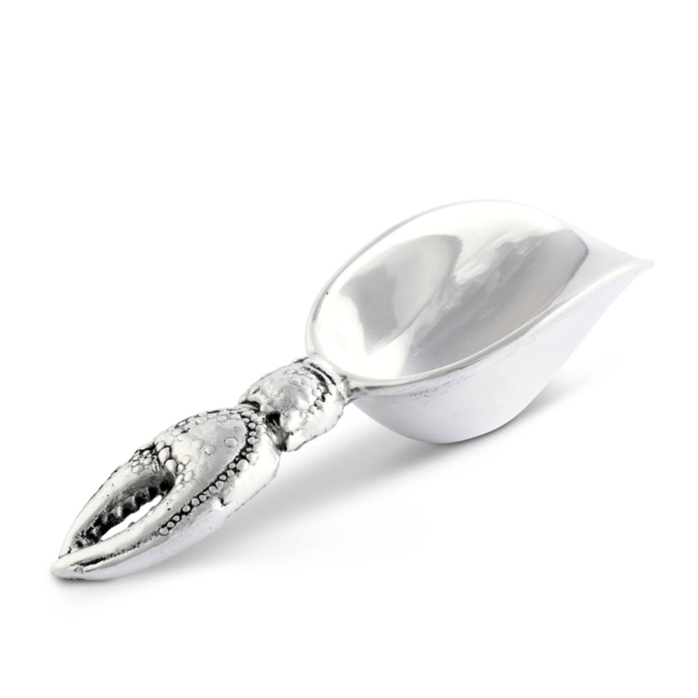 Silver crab claw charm on a white background