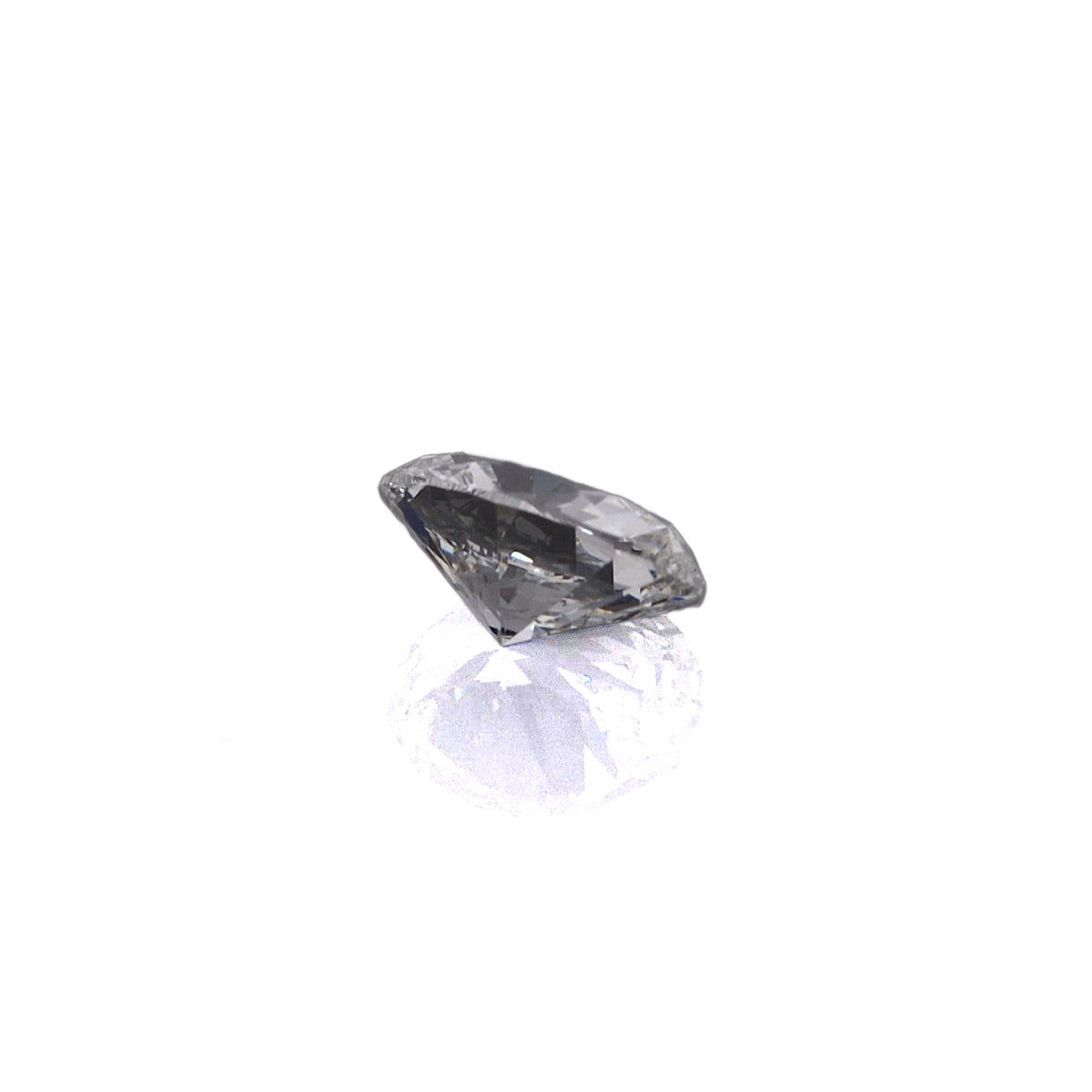 An oval-cut diamond gemstone with a brilliant faceted cut, displayed on a clean white background with a subtle reflection below.