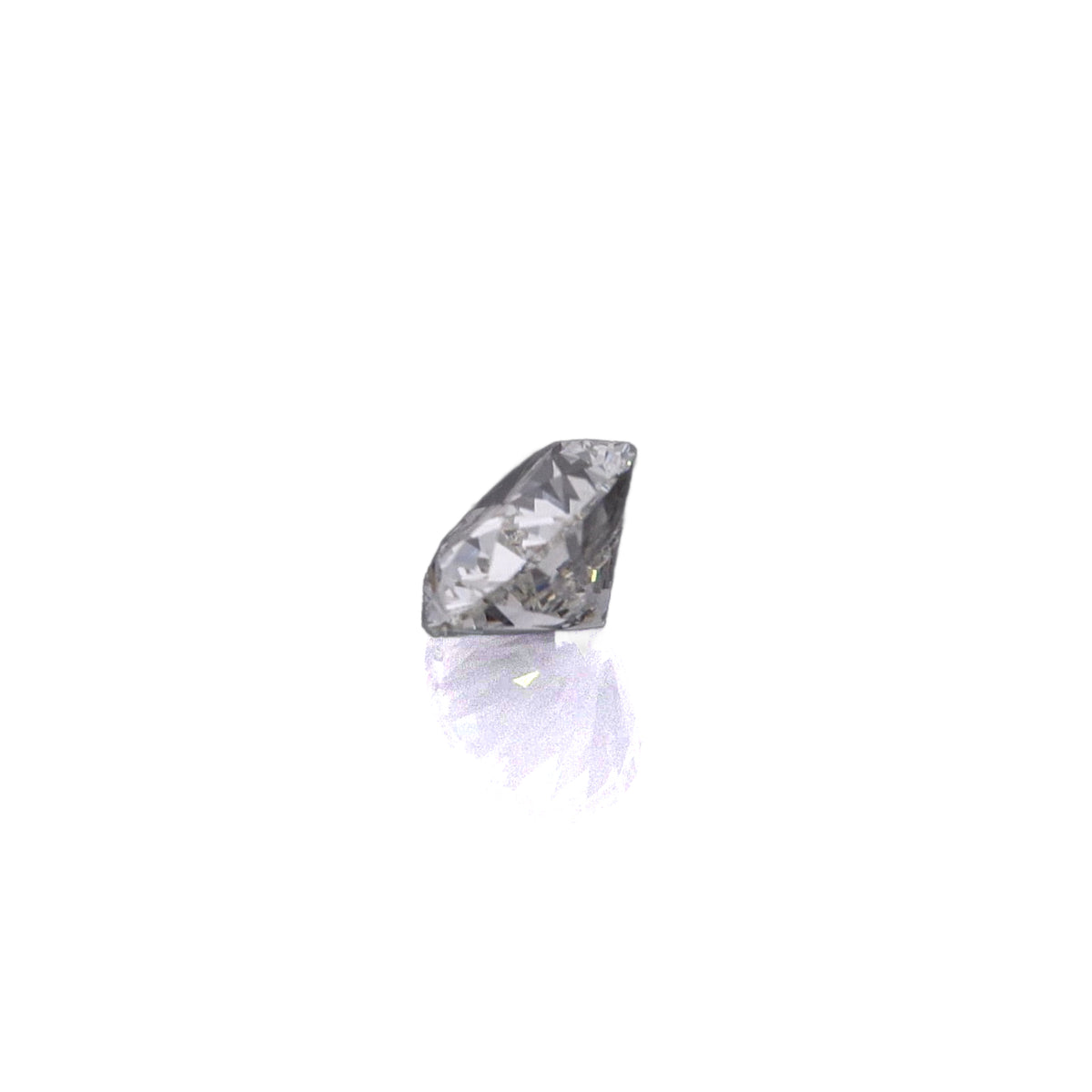 An oval-cut diamond gemstone with a brilliant faceted cut, displayed on a clean white background with a subtle reflection below.