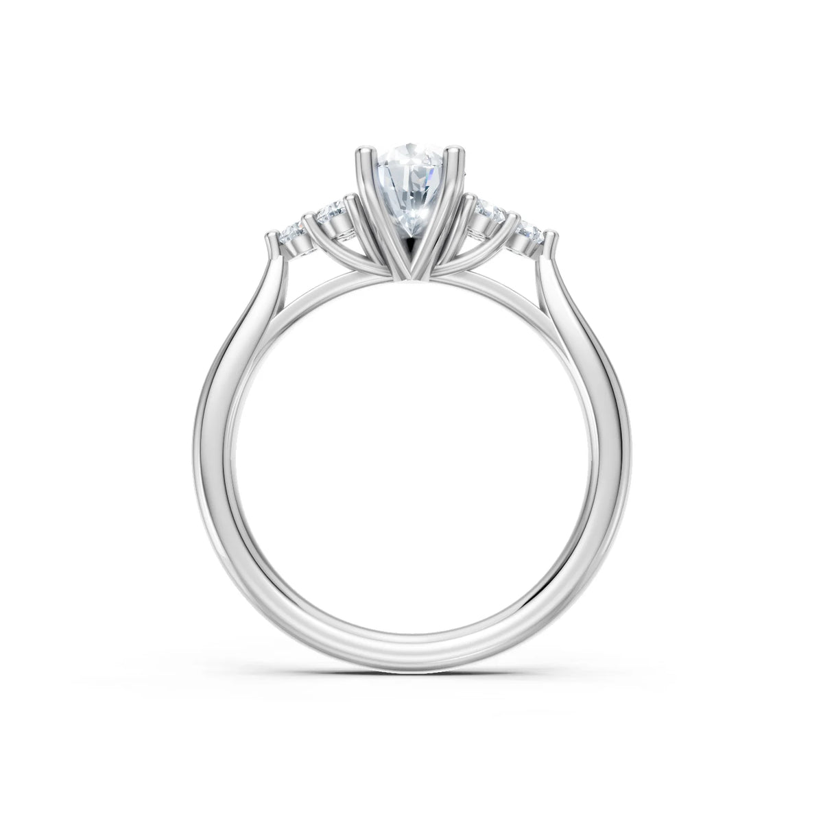 A silver-toned diamond ring with a marquise-cut center stone and smaller diamonds along the shoulders, shown on a clean white background.