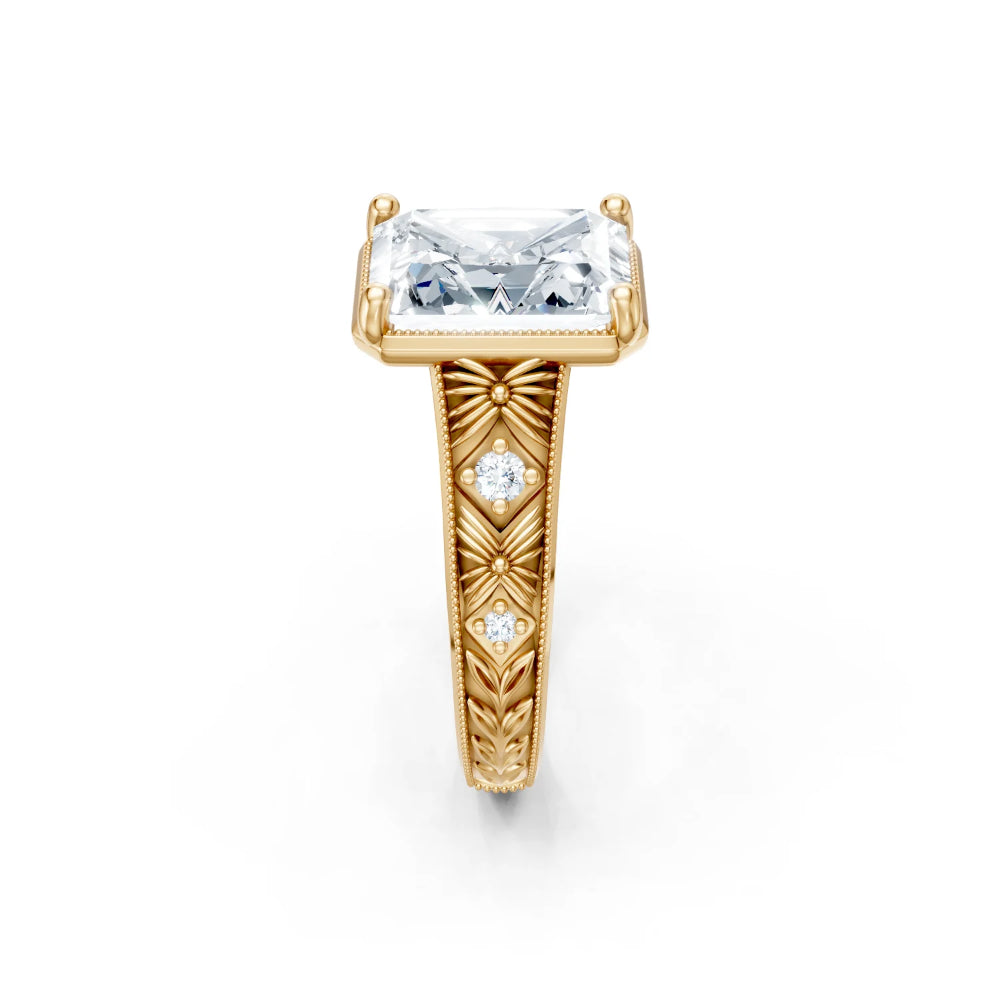 Gold ring with a large diamond and intricate design on a white background